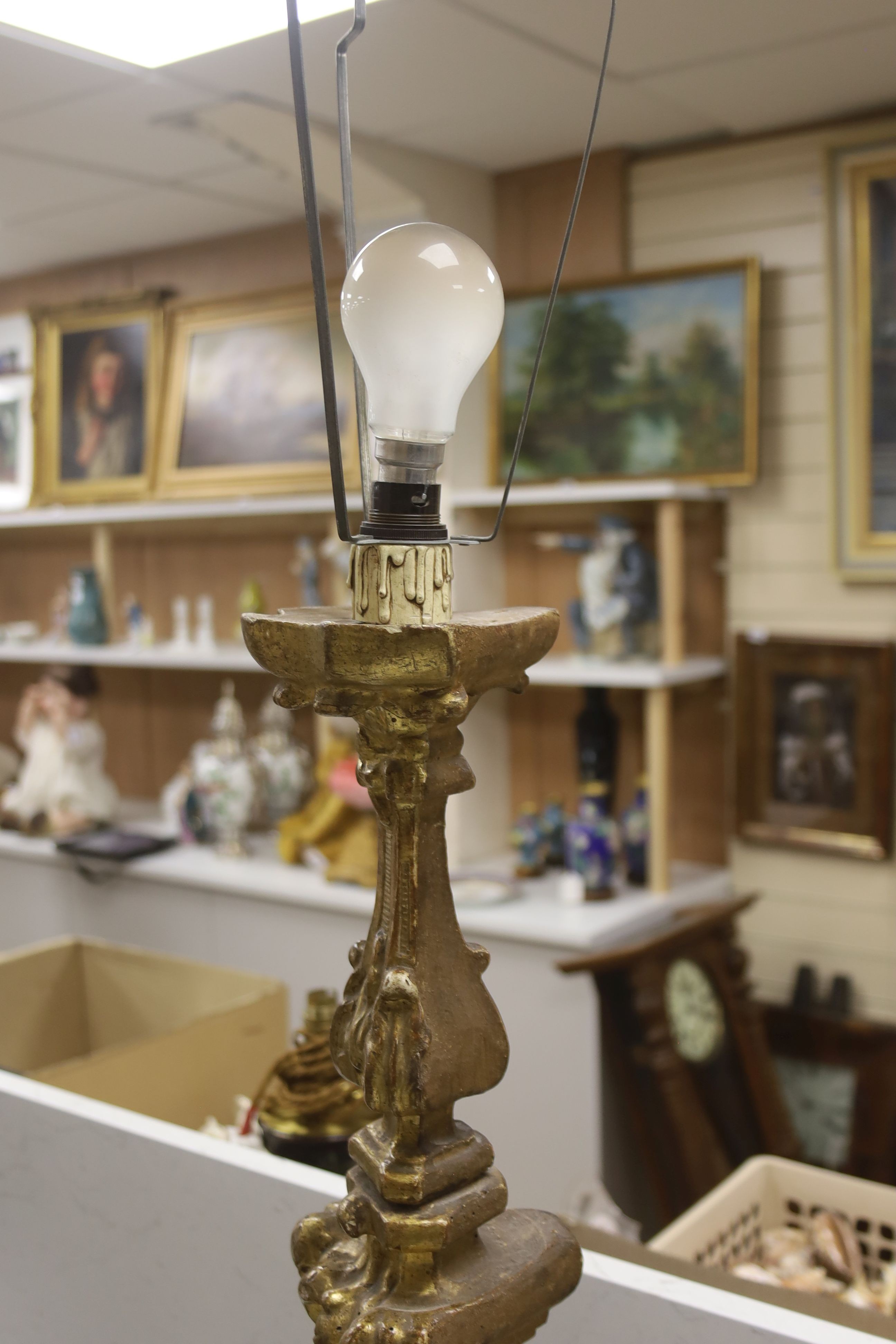 A giltwood altar candlestick as a lamp, height 71cm (excl. light fitting) and a plaster bust of Mozart